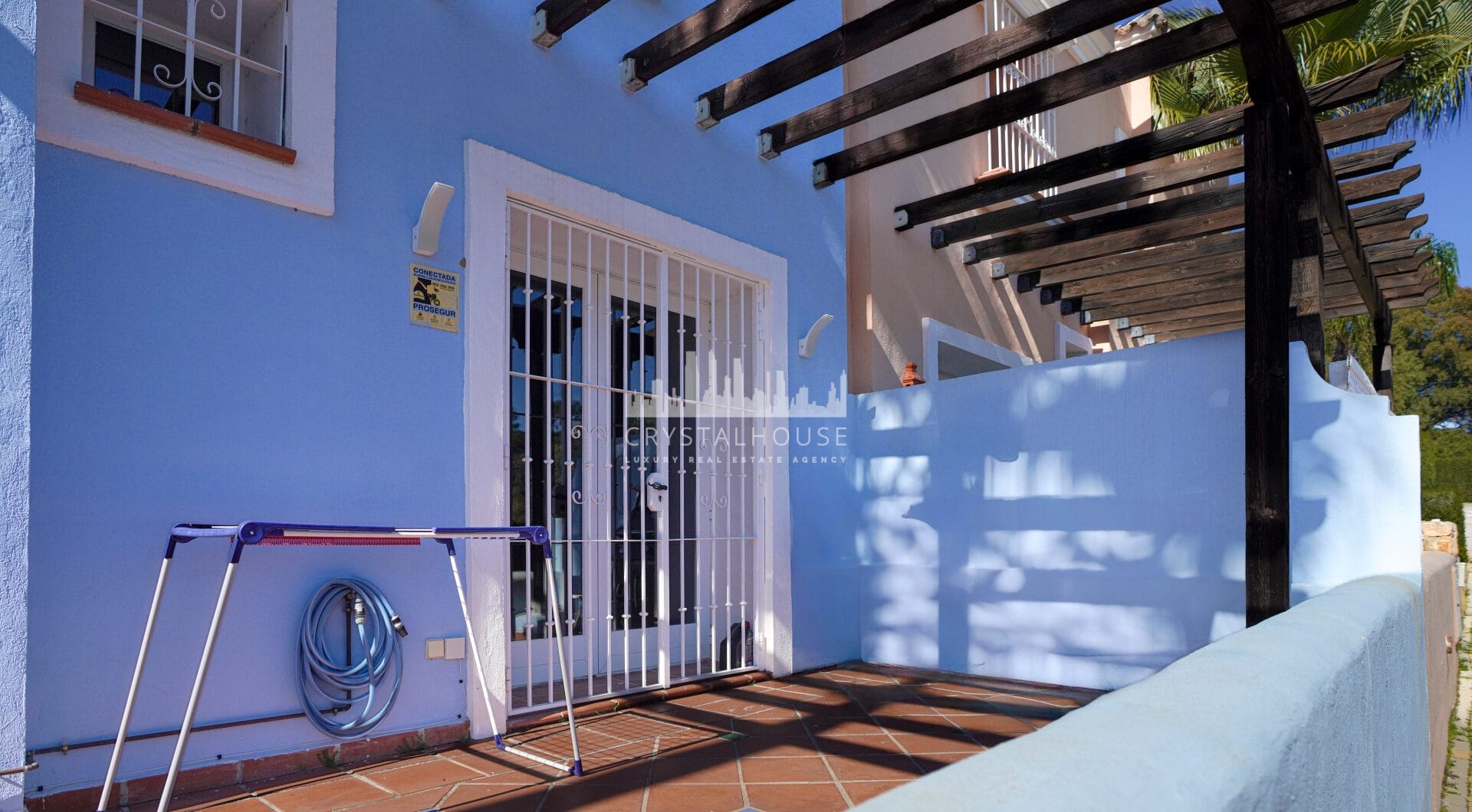 Elegant two bedroom, south west facing townhouse set within an exclusive gated community of Nueva Andalucia, Marbella