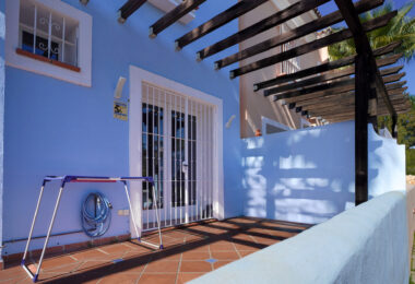 Elegant two bedroom, south west facing townhouse set within an exclusive gated community of Nueva Andalucia, Marbella
