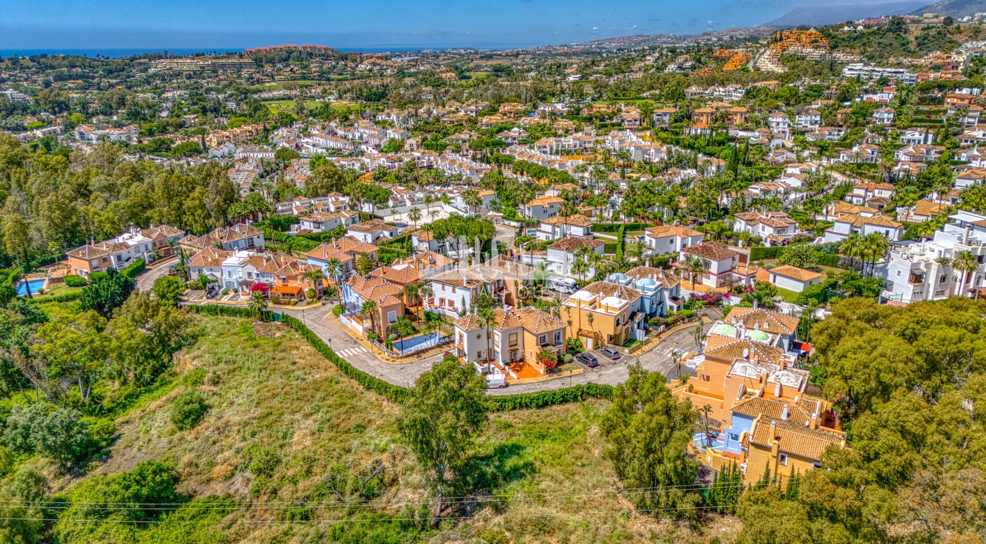Elegant two bedroom, south west facing townhouse set within an exclusive gated community of Nueva Andalucia, Marbella