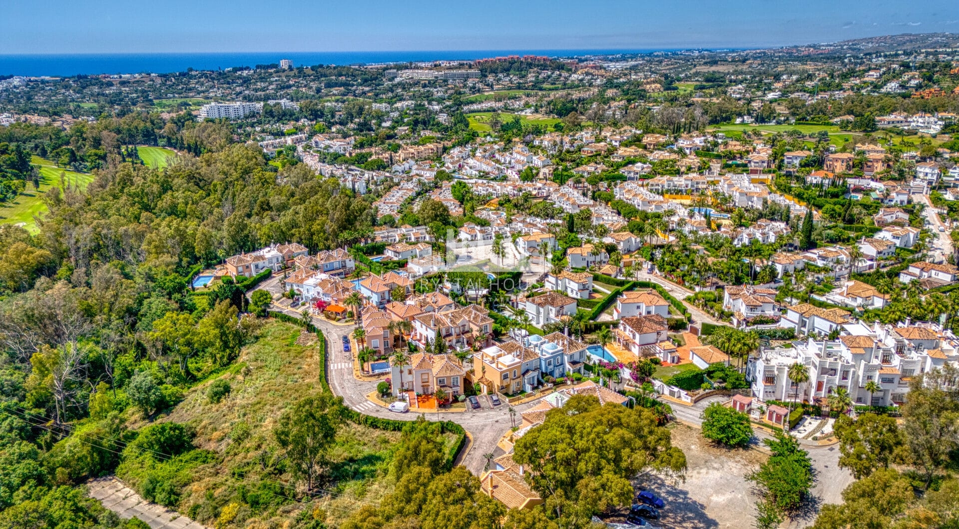 Elegant two bedroom, south west facing townhouse set within an exclusive gated community of Nueva Andalucia, Marbella