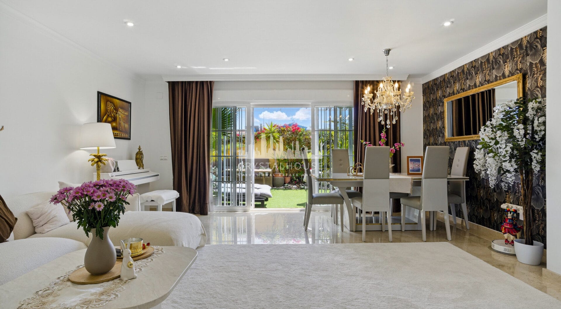 Four bedroom beautifully reformed south facing townhouse in a gated residential community in Calahonda