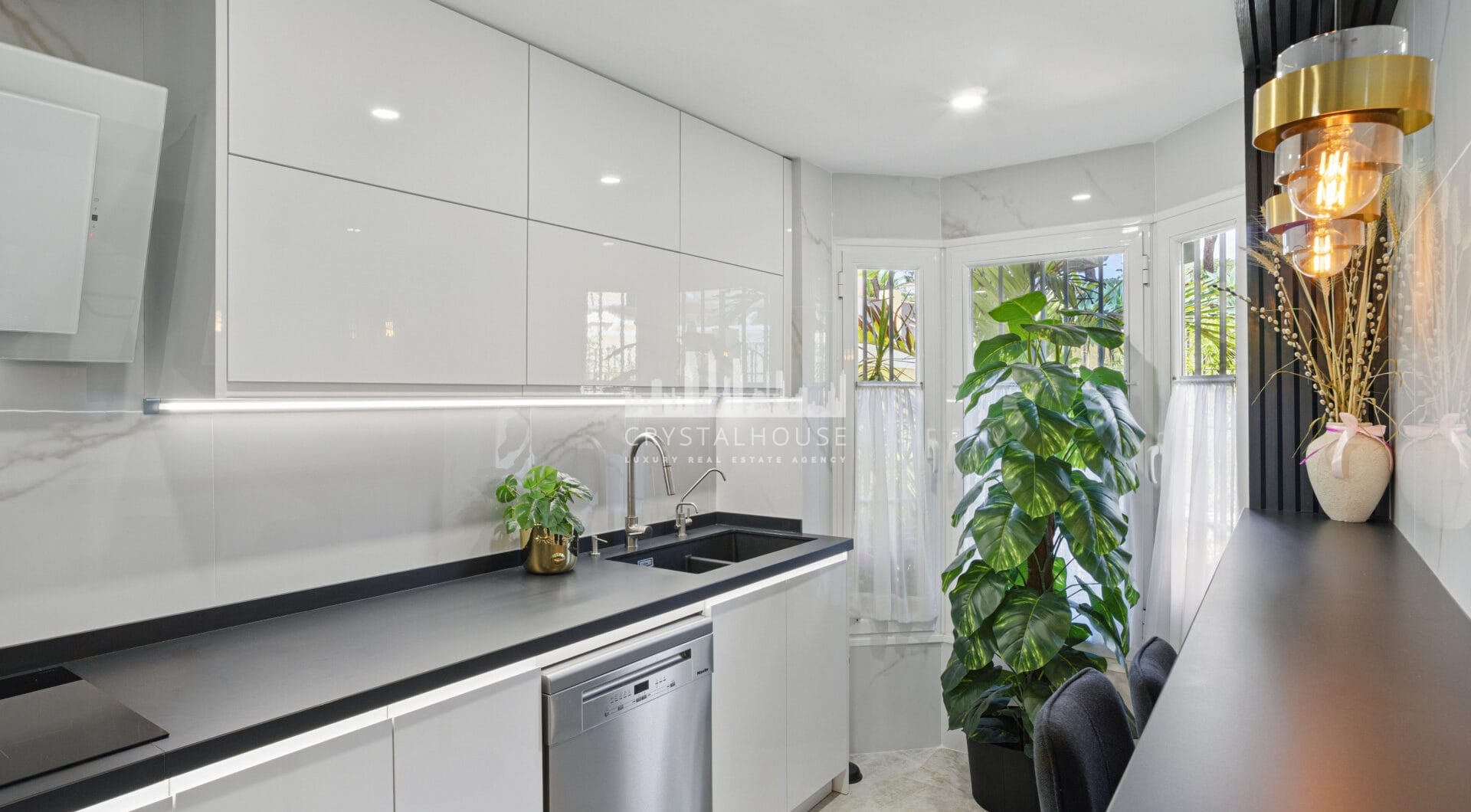 Four bedroom beautifully reformed south facing townhouse in a gated residential community in Calahonda