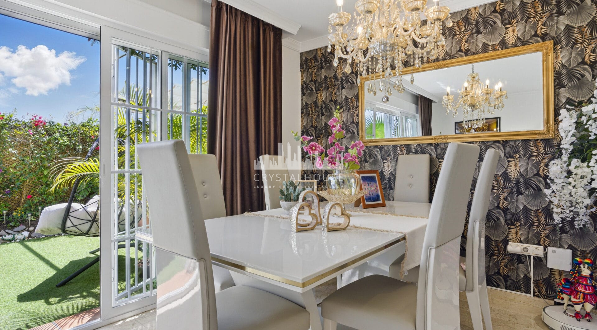 Four bedroom beautifully reformed south facing townhouse in a gated residential community in Calahonda