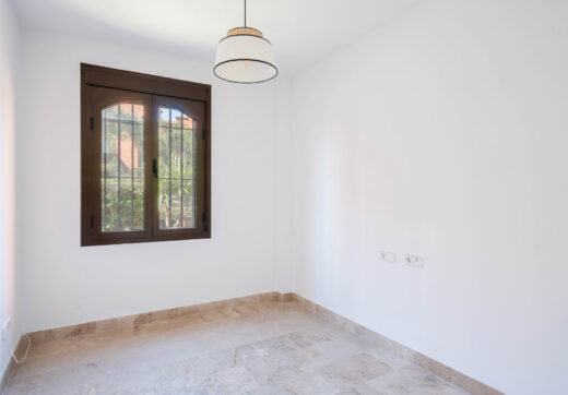 Elegant Coastal Living in Estepona – Corner Garden Apartment with Style &amp; Serenity in Costa Galera