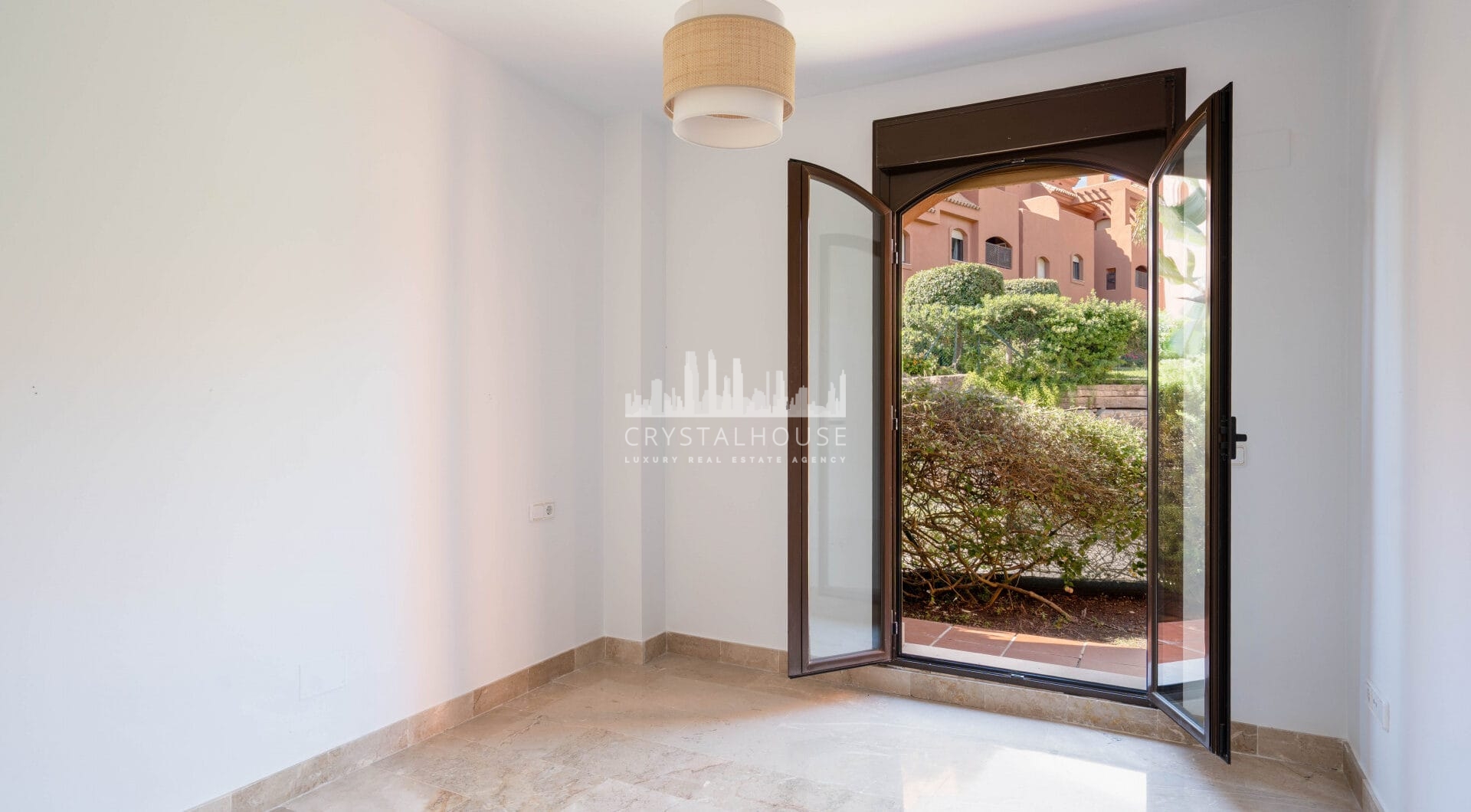 Elegant Coastal Living in Estepona – Corner Garden Apartment with Style &amp; Serenity in Costa Galera