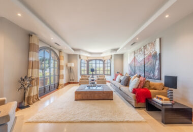 A superb villa built on an elevated site with outstanding panoramic views over golf courses to mountains and the sea.