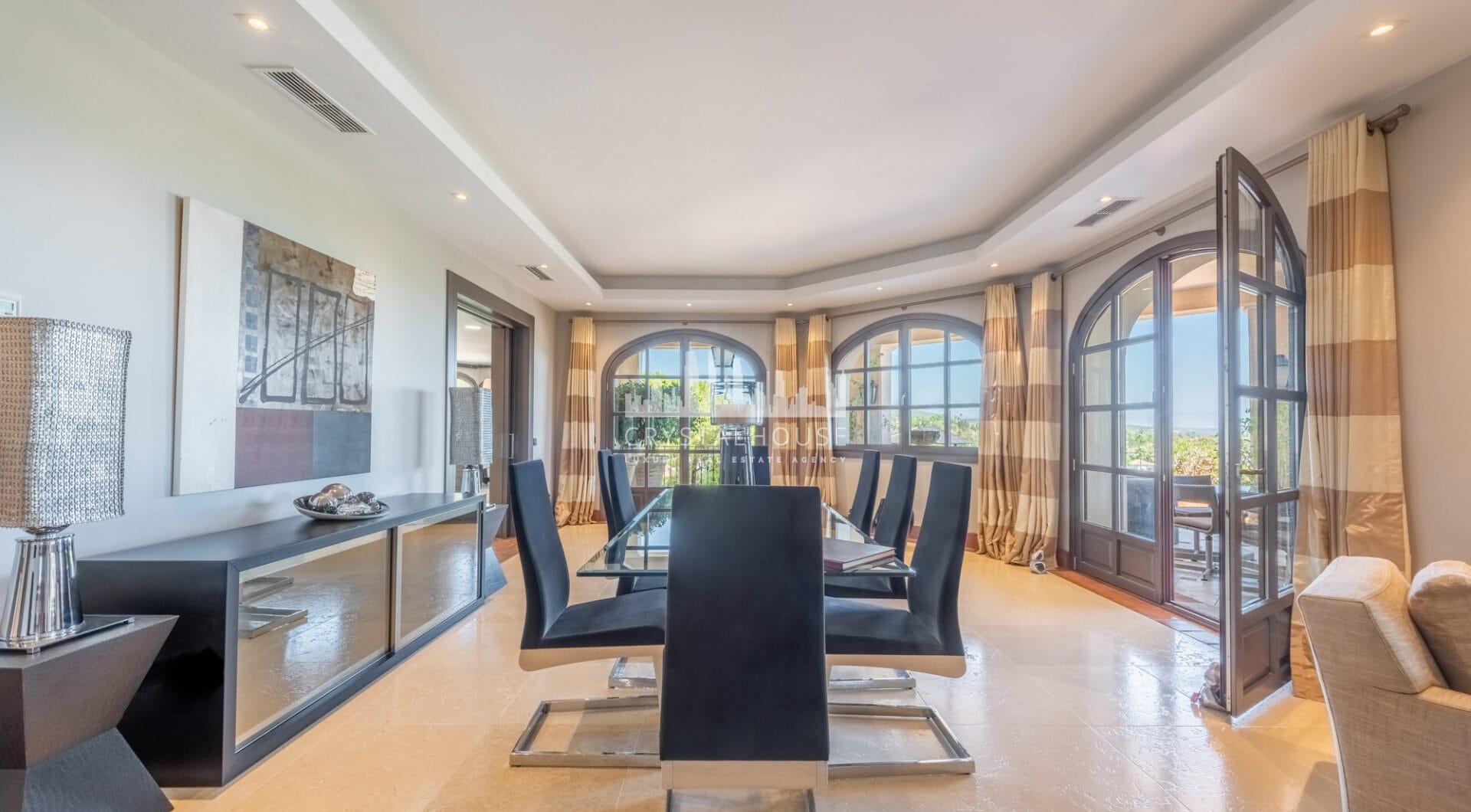 A superb villa built on an elevated site with outstanding panoramic views over golf courses to mountains and the sea.