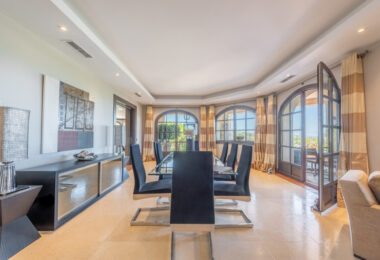 A superb villa built on an elevated site with outstanding panoramic views over golf courses to mountains and the sea.