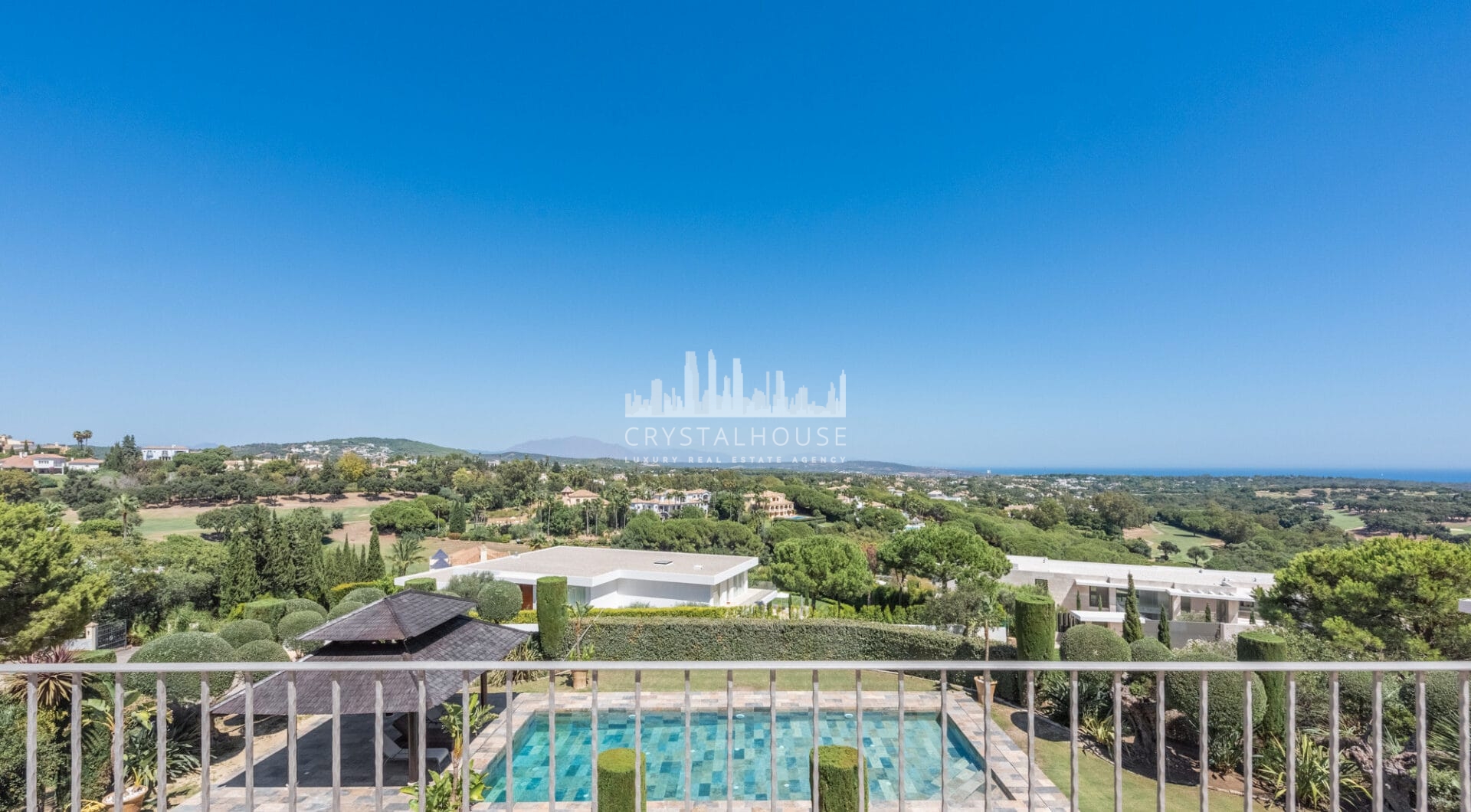 A superb villa built on an elevated site with outstanding panoramic views over golf courses to mountains and the sea.