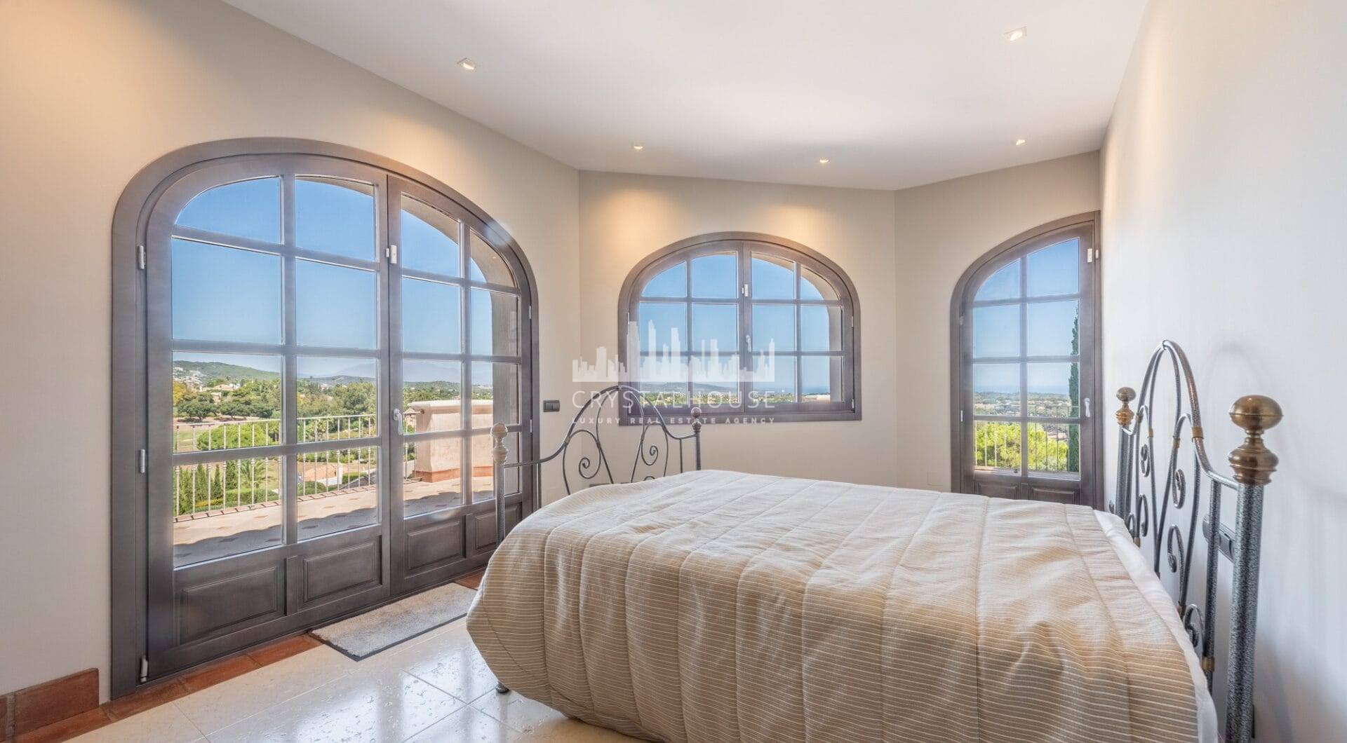 A superb villa built on an elevated site with outstanding panoramic views over golf courses to mountains and the sea.