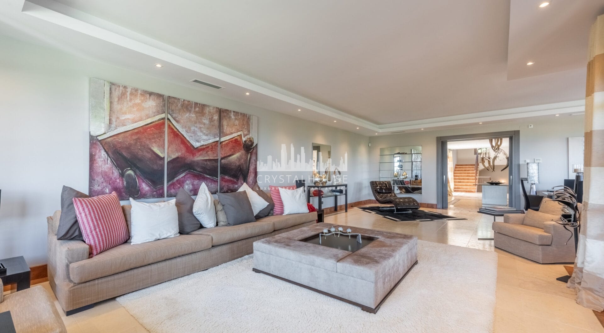 A superb villa built on an elevated site with outstanding panoramic views over golf courses to mountains and the sea.