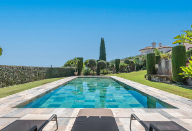 A superb villa built on an elevated site with outstanding panoramic views over golf courses to mountains and the sea.
