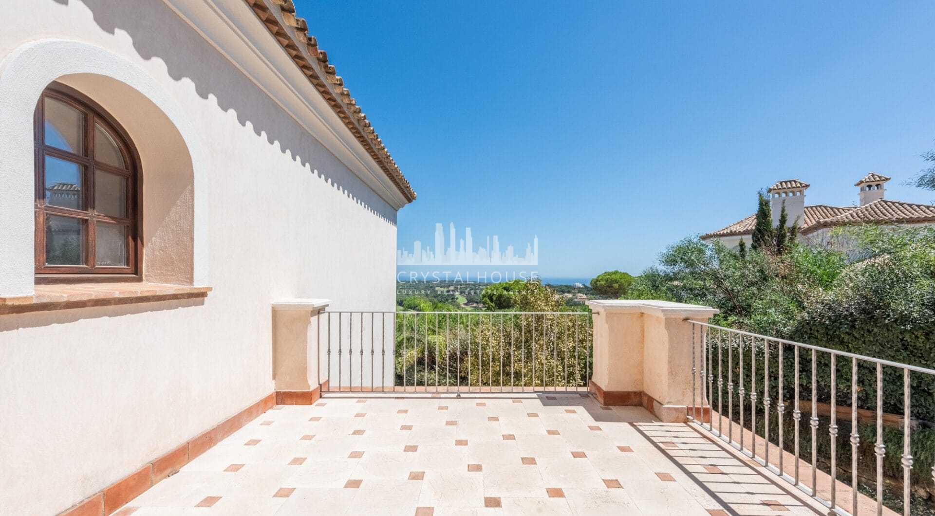 A superb villa built on an elevated site with outstanding panoramic views over golf courses to mountains and the sea.
