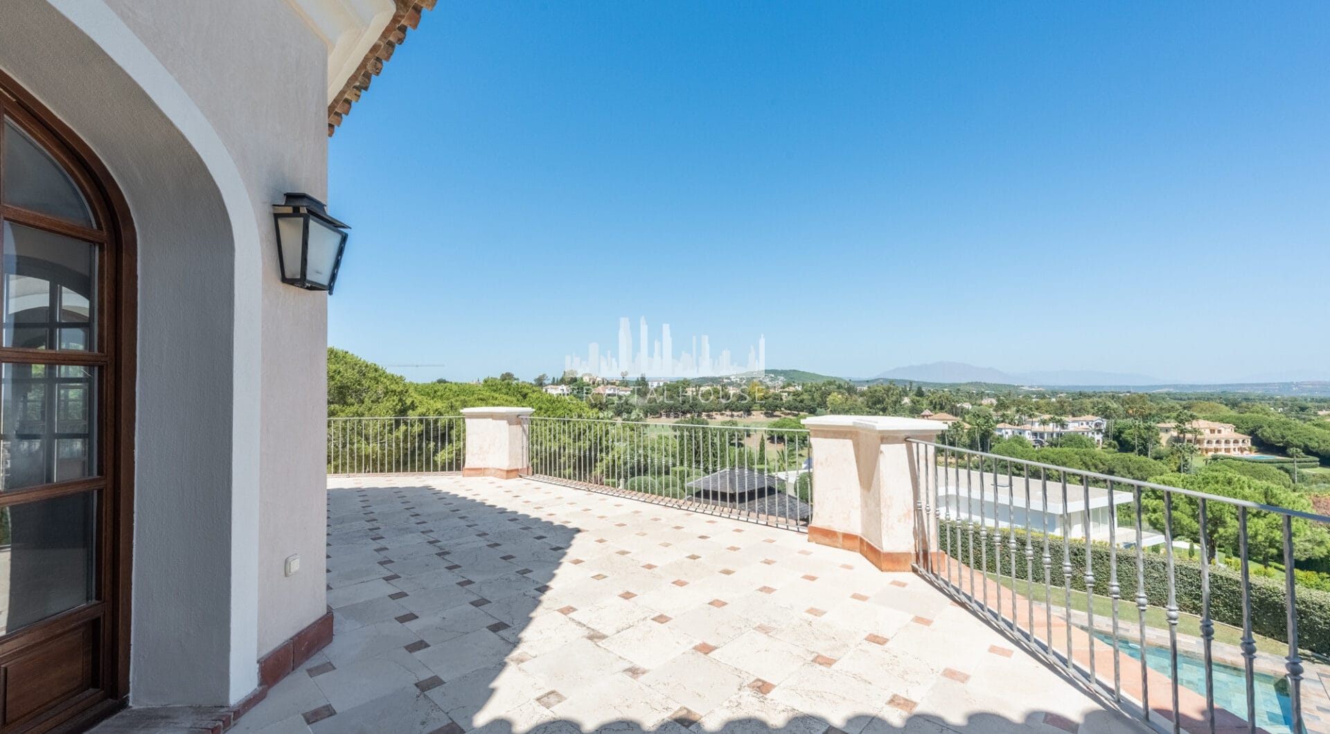 A superb villa built on an elevated site with outstanding panoramic views over golf courses to mountains and the sea.