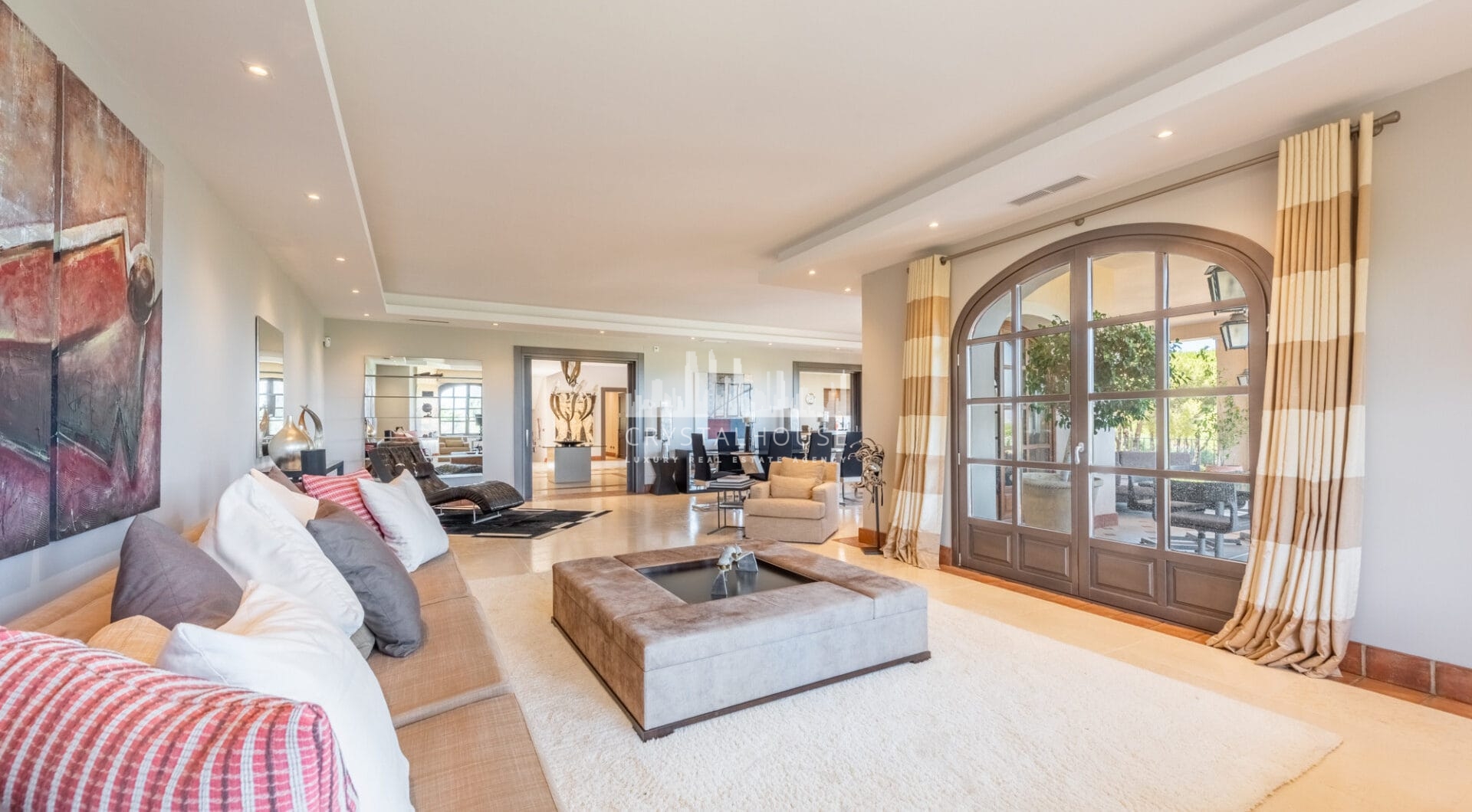 A superb villa built on an elevated site with outstanding panoramic views over golf courses to mountains and the sea.