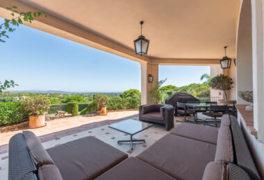 A superb villa built on an elevated site with outstanding panoramic views over golf courses to mountains and the sea.
