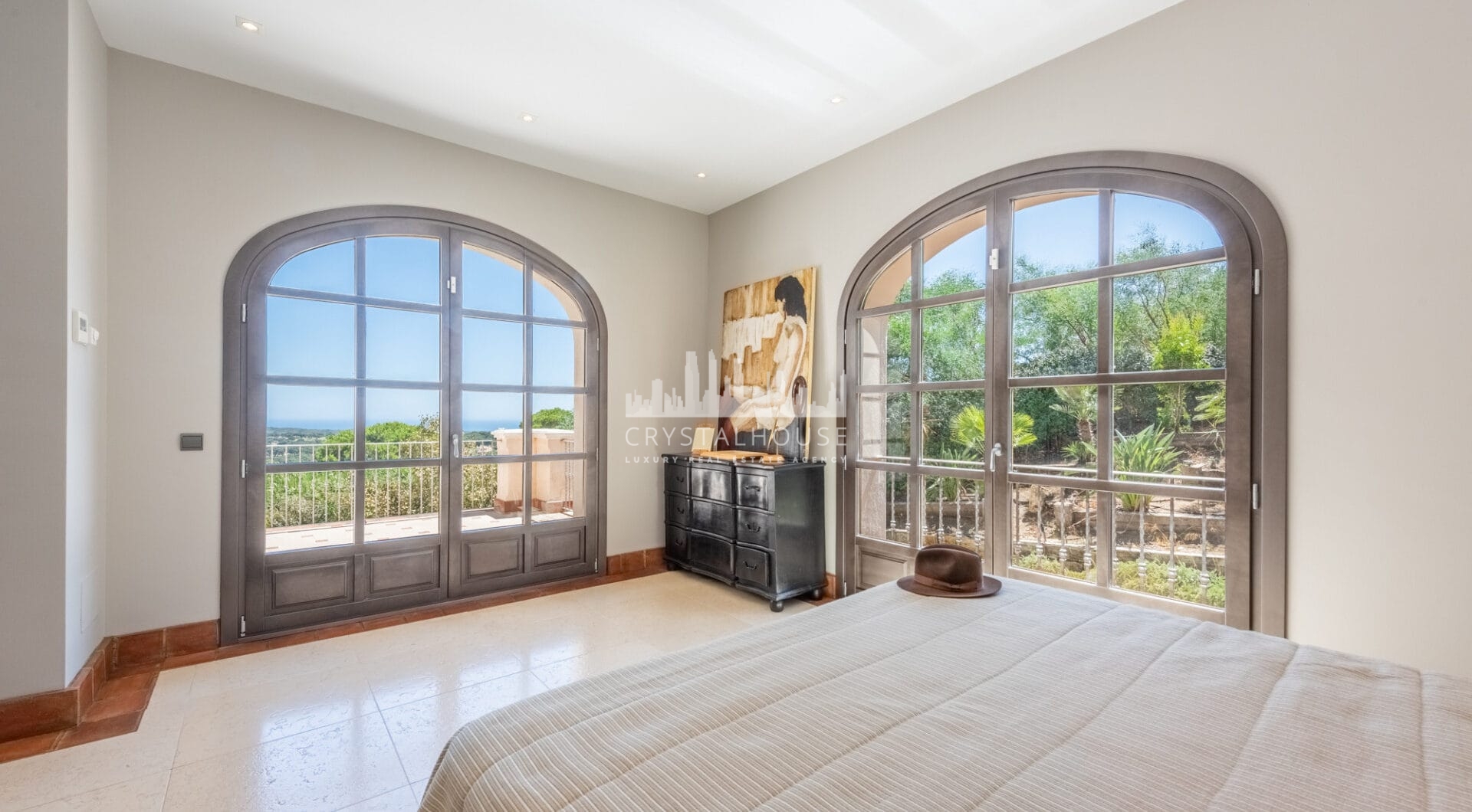 A superb villa built on an elevated site with outstanding panoramic views over golf courses to mountains and the sea.