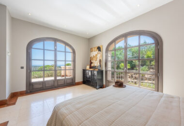 A superb villa built on an elevated site with outstanding panoramic views over golf courses to mountains and the sea.
