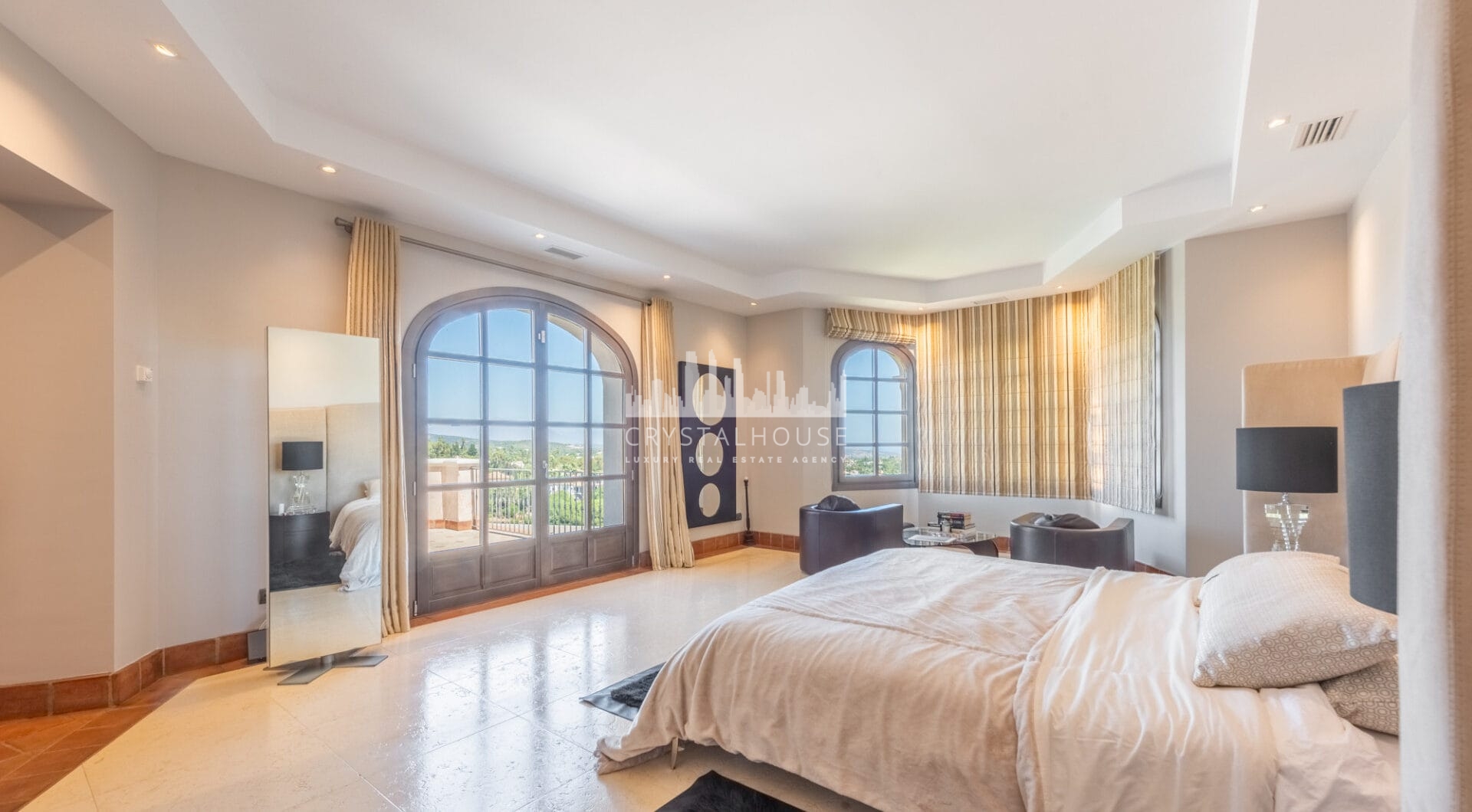 A superb villa built on an elevated site with outstanding panoramic views over golf courses to mountains and the sea.