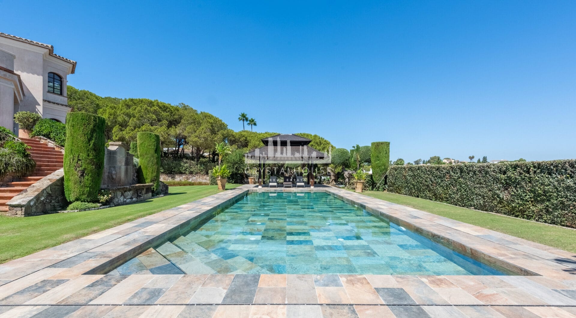 A superb villa built on an elevated site with outstanding panoramic views over golf courses to mountains and the sea.