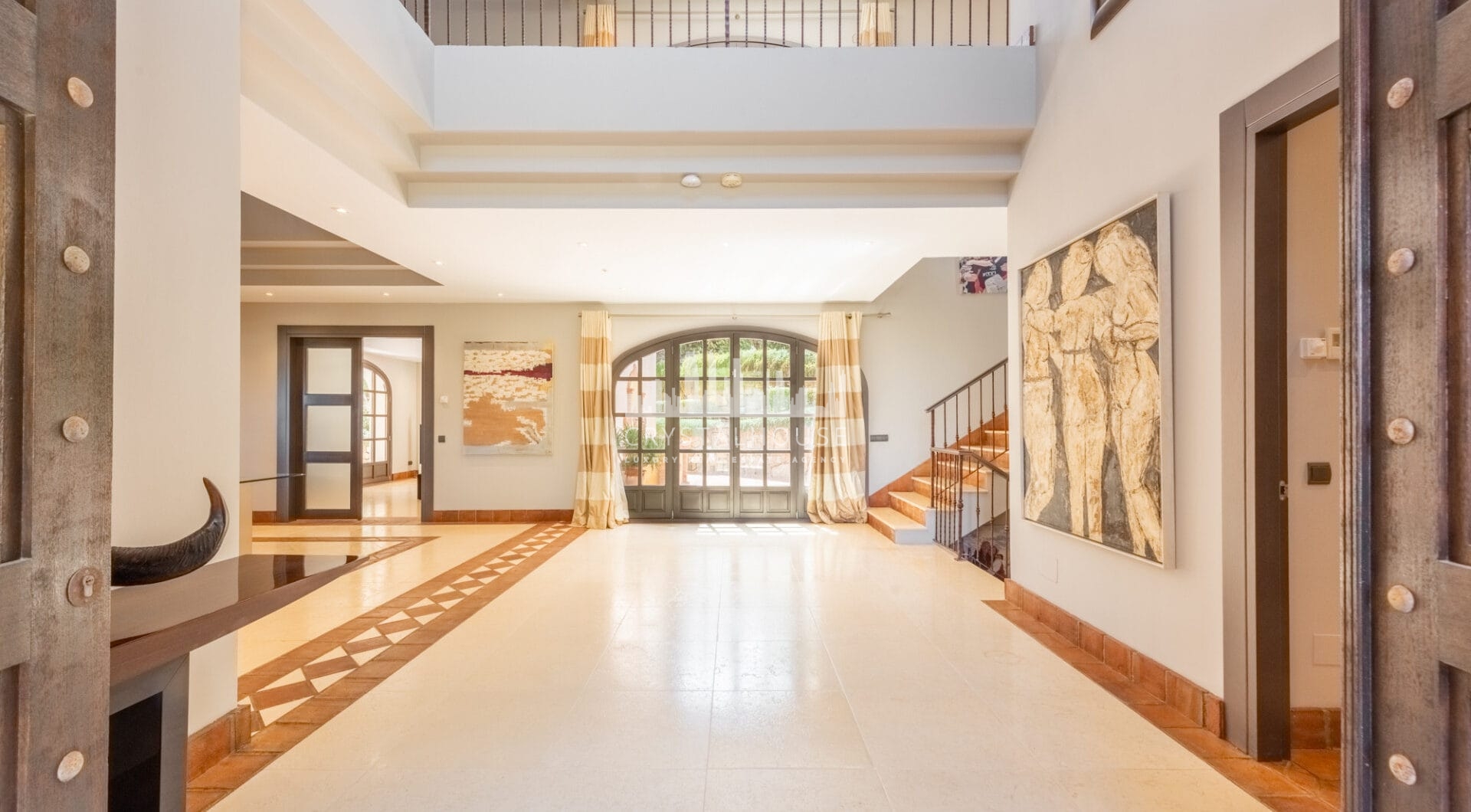 A superb villa built on an elevated site with outstanding panoramic views over golf courses to mountains and the sea.