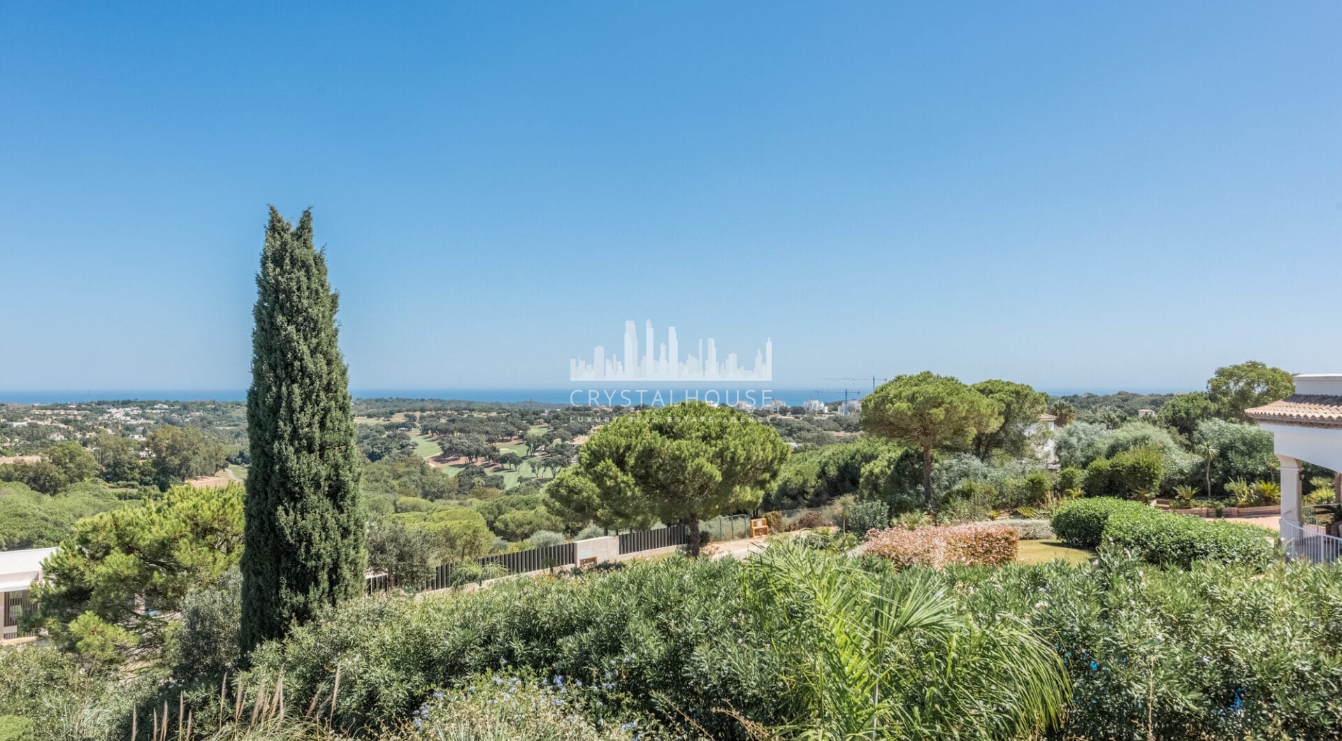 A superb villa built on an elevated site with outstanding panoramic views over golf courses to mountains and the sea.