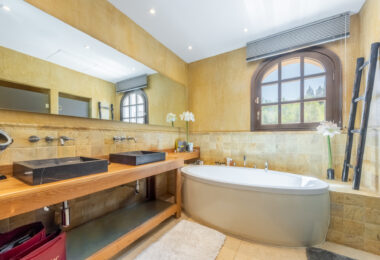 A superb villa built on an elevated site with outstanding panoramic views over golf courses to mountains and the sea.