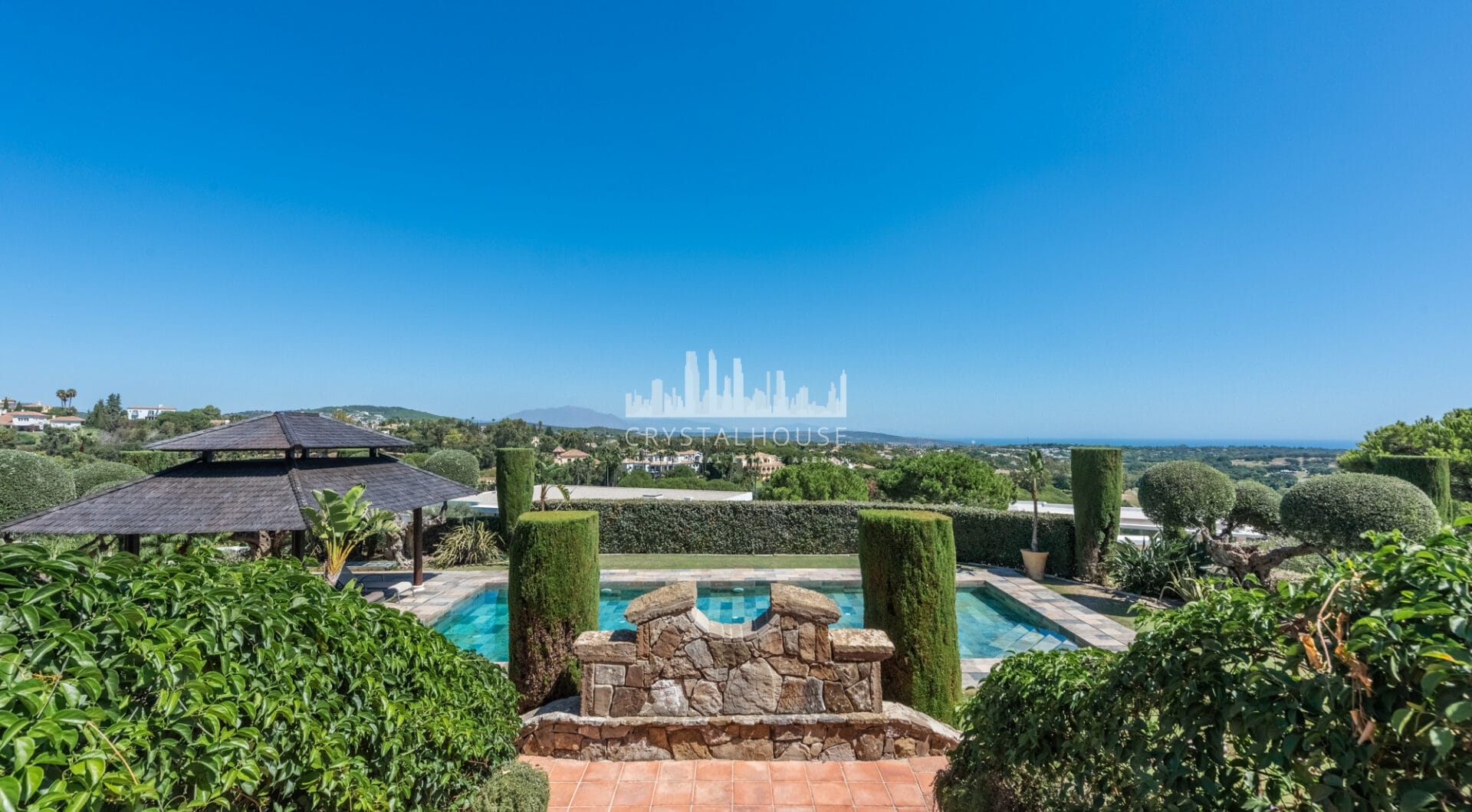 A superb villa built on an elevated site with outstanding panoramic views over golf courses to mountains and the sea.