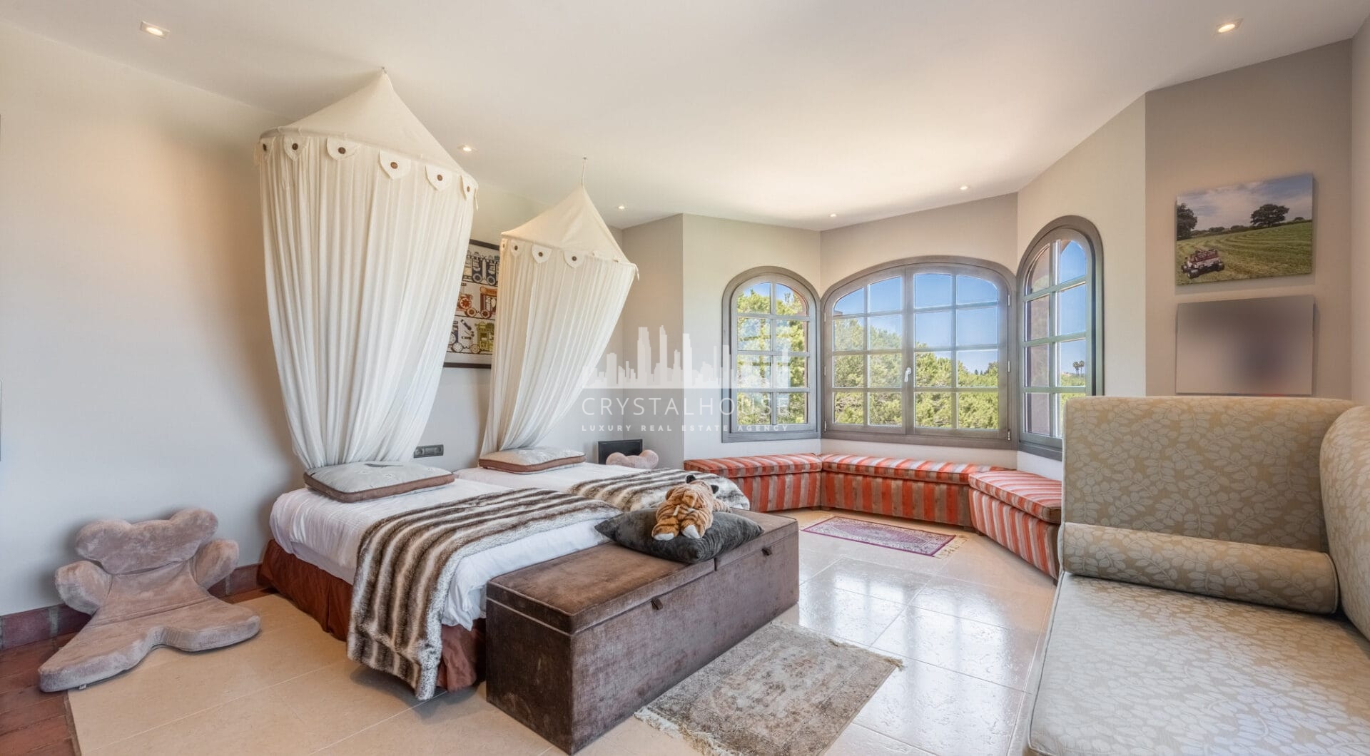A superb villa built on an elevated site with outstanding panoramic views over golf courses to mountains and the sea.