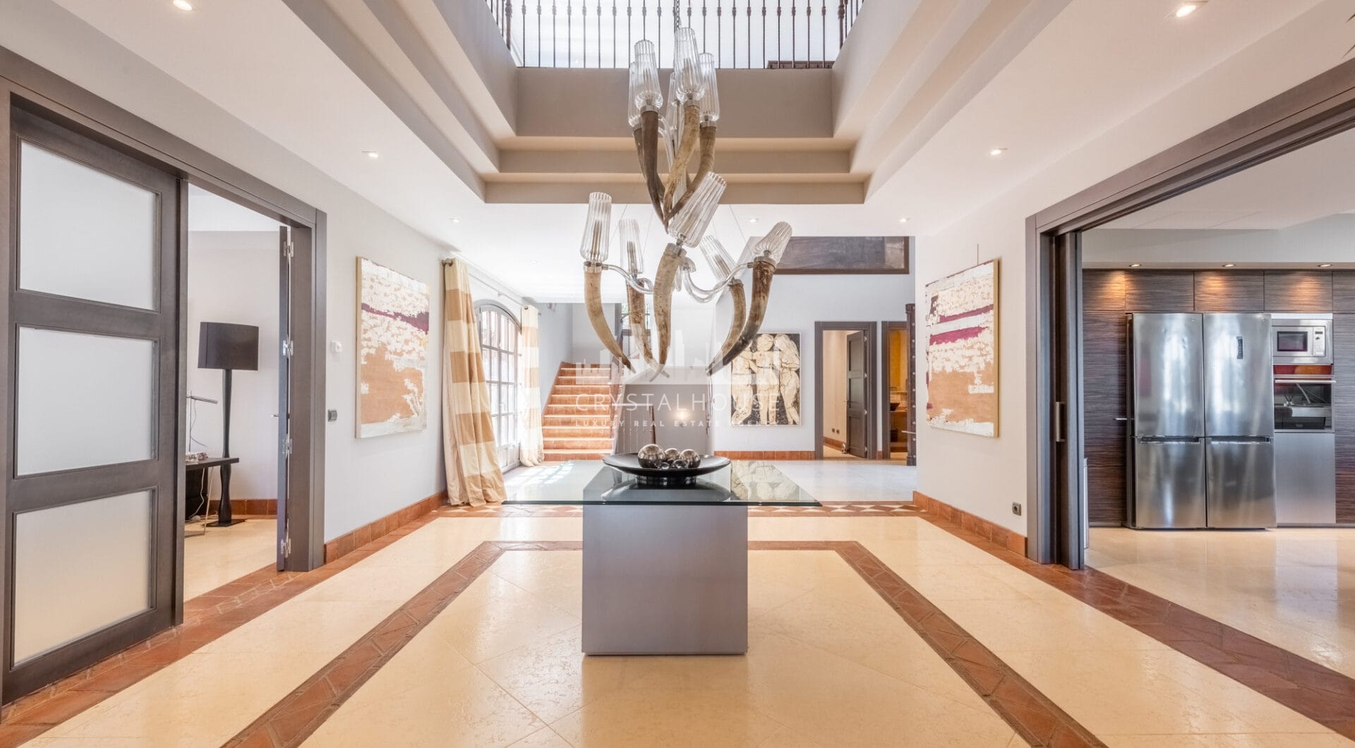 A superb villa built on an elevated site with outstanding panoramic views over golf courses to mountains and the sea.