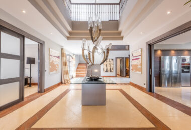 A superb villa built on an elevated site with outstanding panoramic views over golf courses to mountains and the sea.
