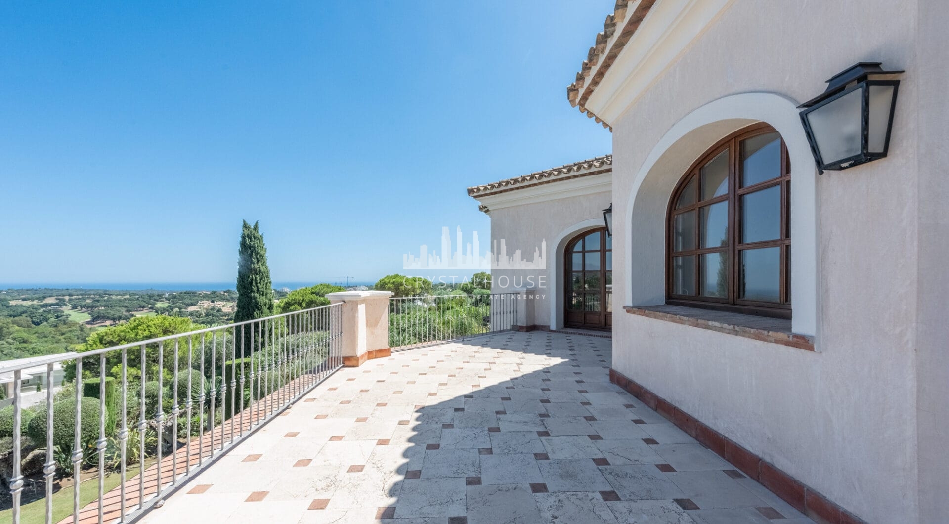 A superb villa built on an elevated site with outstanding panoramic views over golf courses to mountains and the sea.