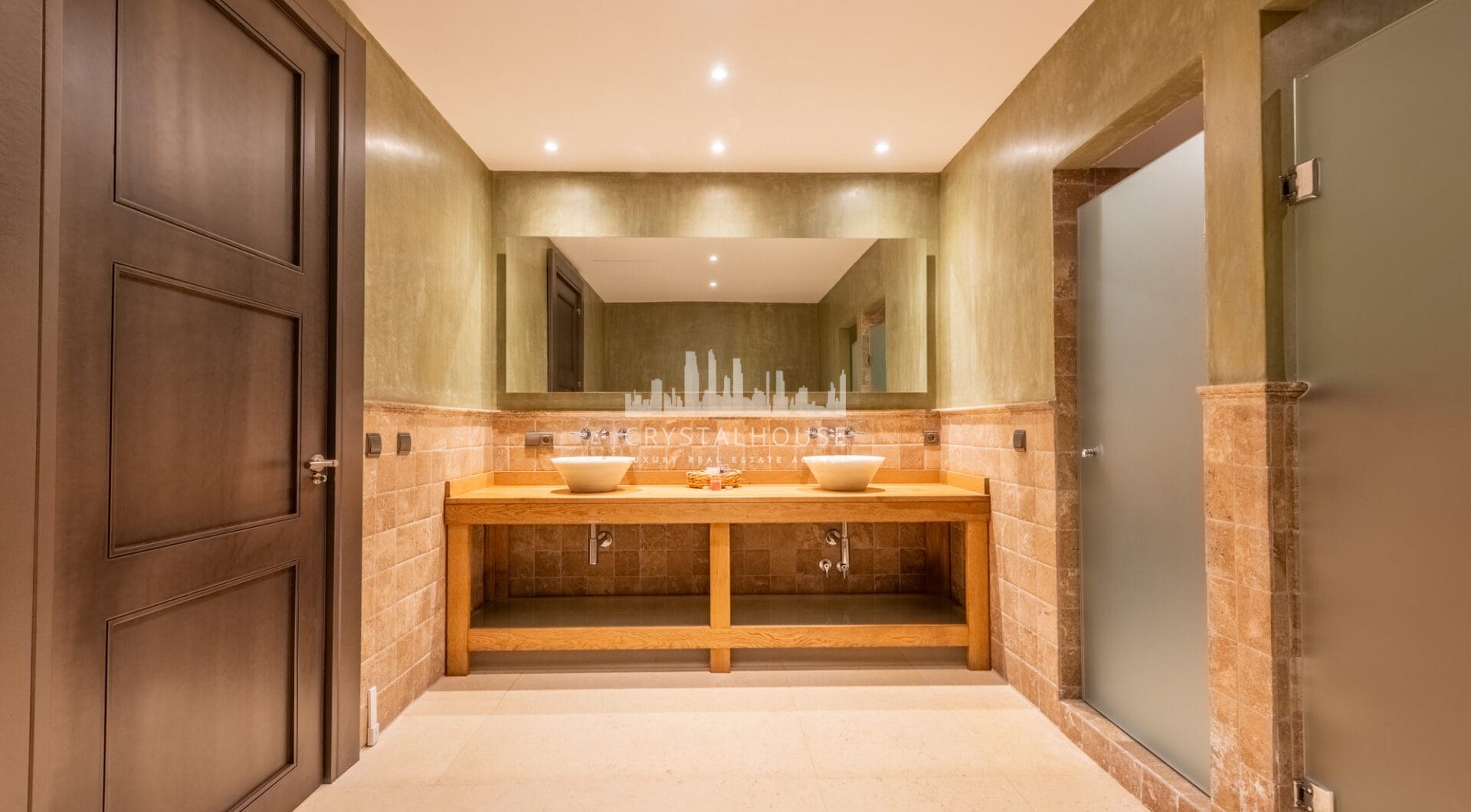 A superb villa built on an elevated site with outstanding panoramic views over golf courses to mountains and the sea.