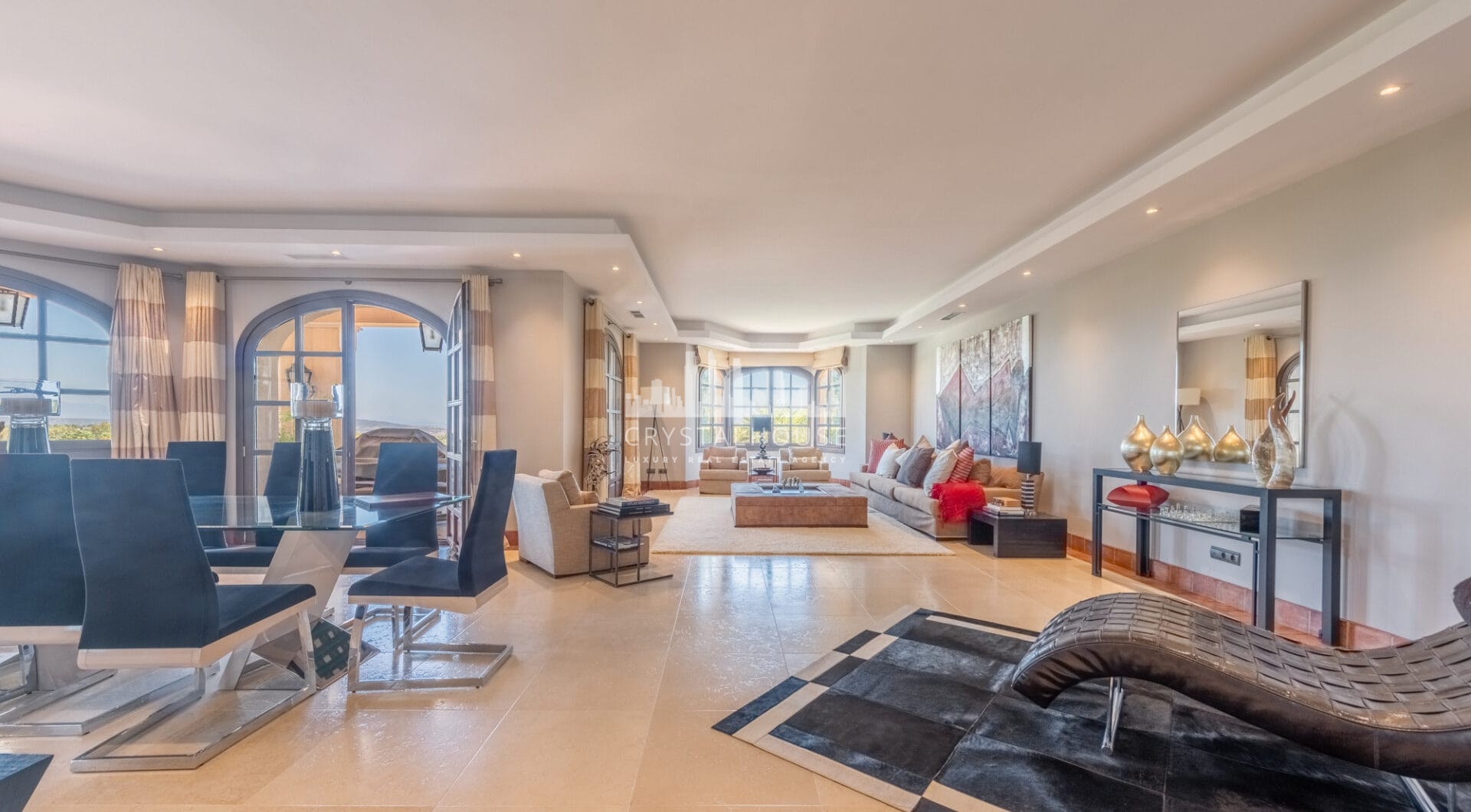 A superb villa built on an elevated site with outstanding panoramic views over golf courses to mountains and the sea.