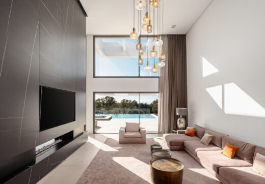 This modern luxury 4-bedroom villa is for sale in La Alquería, a peaceful area renowned for its serene ambiance and breathtaking scenery.