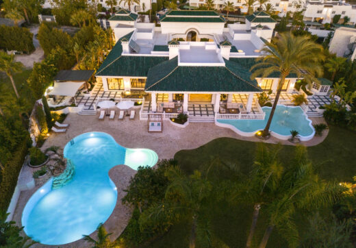 Alhambra Palace stands as an architectural masterpiece, seamlessly blending traditional Andalusian aesthetics with Moorish influences, creating a palatial residence that is both enchanting and evocative.