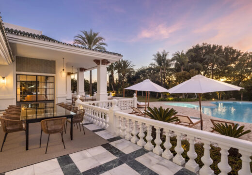 Alhambra Palace stands as an architectural masterpiece, seamlessly blending traditional Andalusian aesthetics with Moorish influences, creating a palatial residence that is both enchanting and evocative.