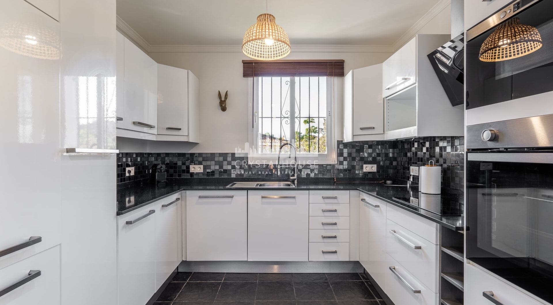 Nestled in a quiet residential area just minutes from Estepona town and the coastline, Villa Jazu offers a refined sense of comfort across 3 carefully designed levels.