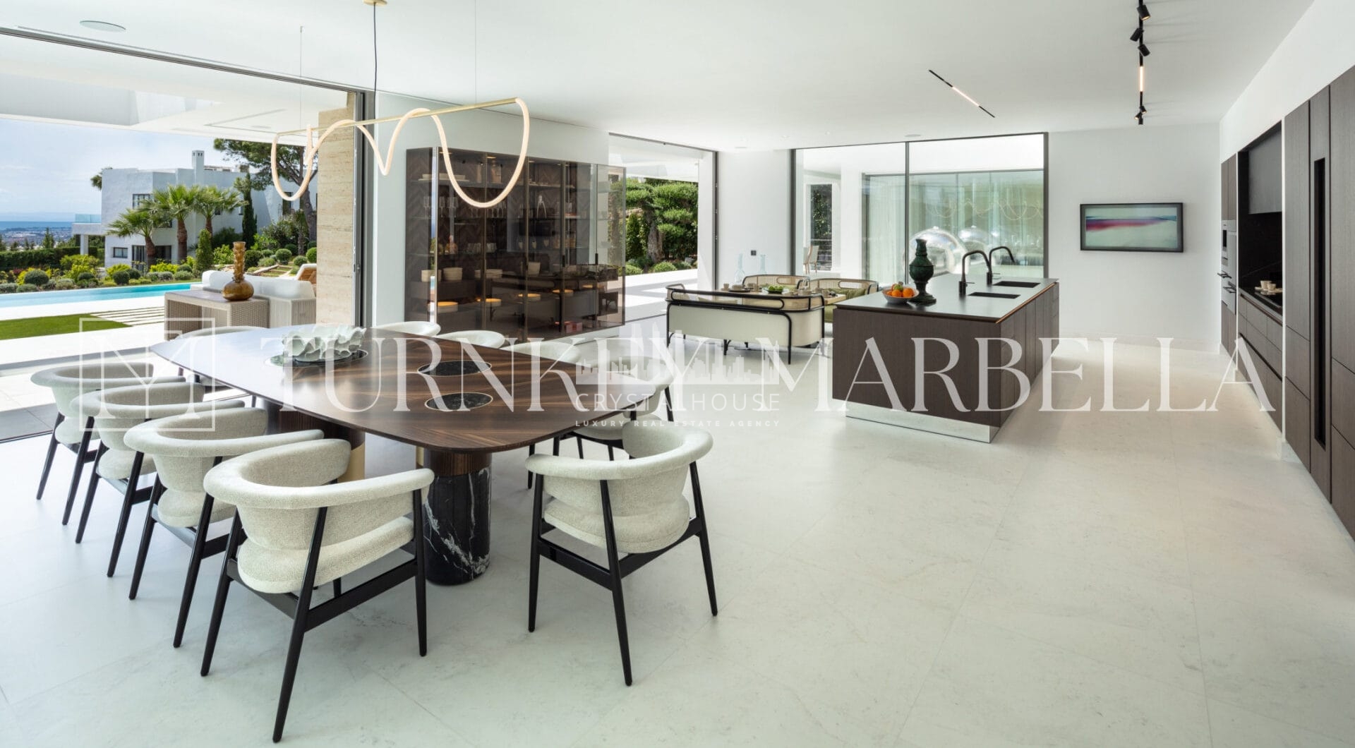 Set in the exclusive gated community of Sierra Blanca, Rossini 13 offers privacy, security, and panoramic sea views stretching to Gibraltar and the African coastline.