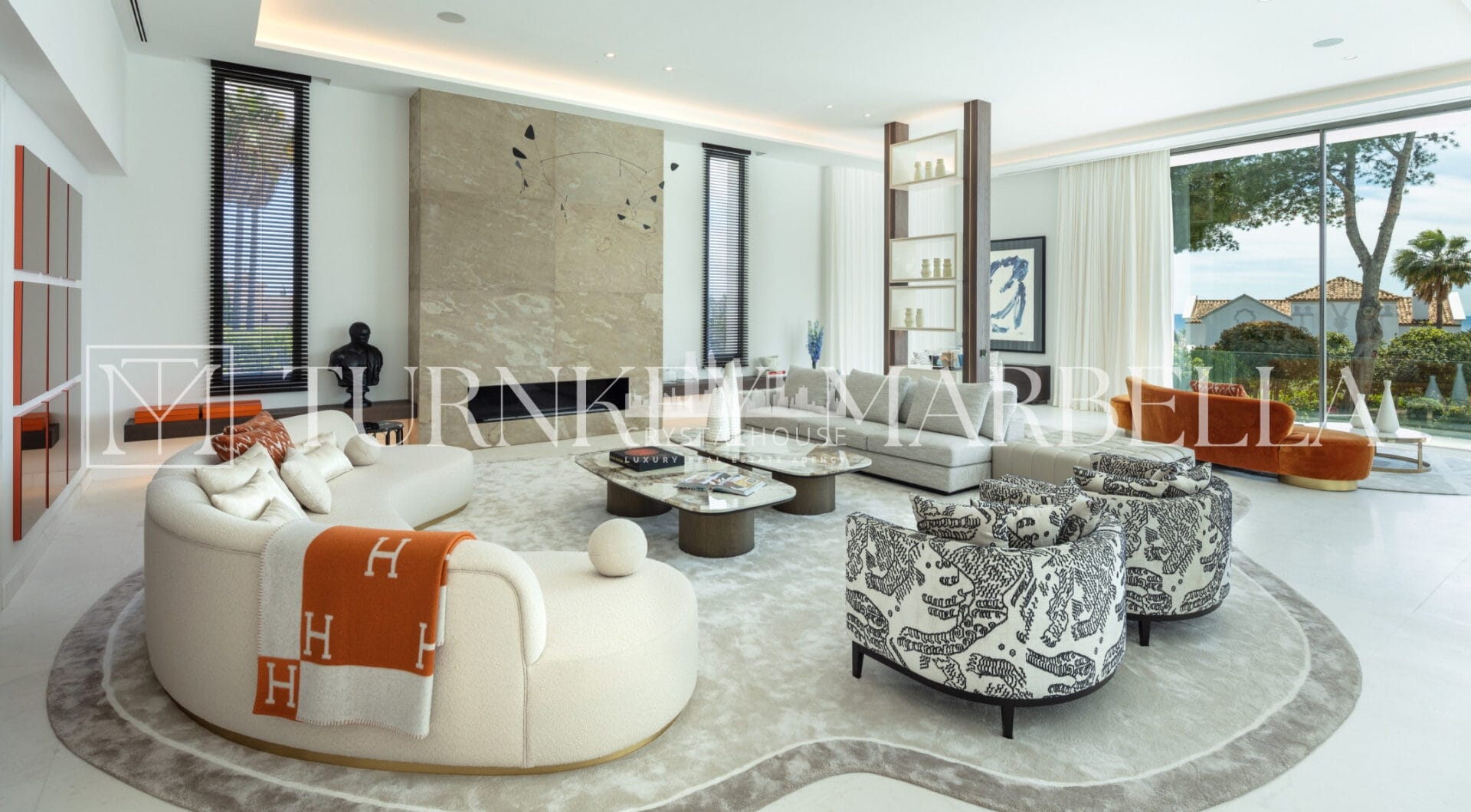 Set in the exclusive gated community of Sierra Blanca, Rossini 13 offers privacy, security, and panoramic sea views stretching to Gibraltar and the African coastline.