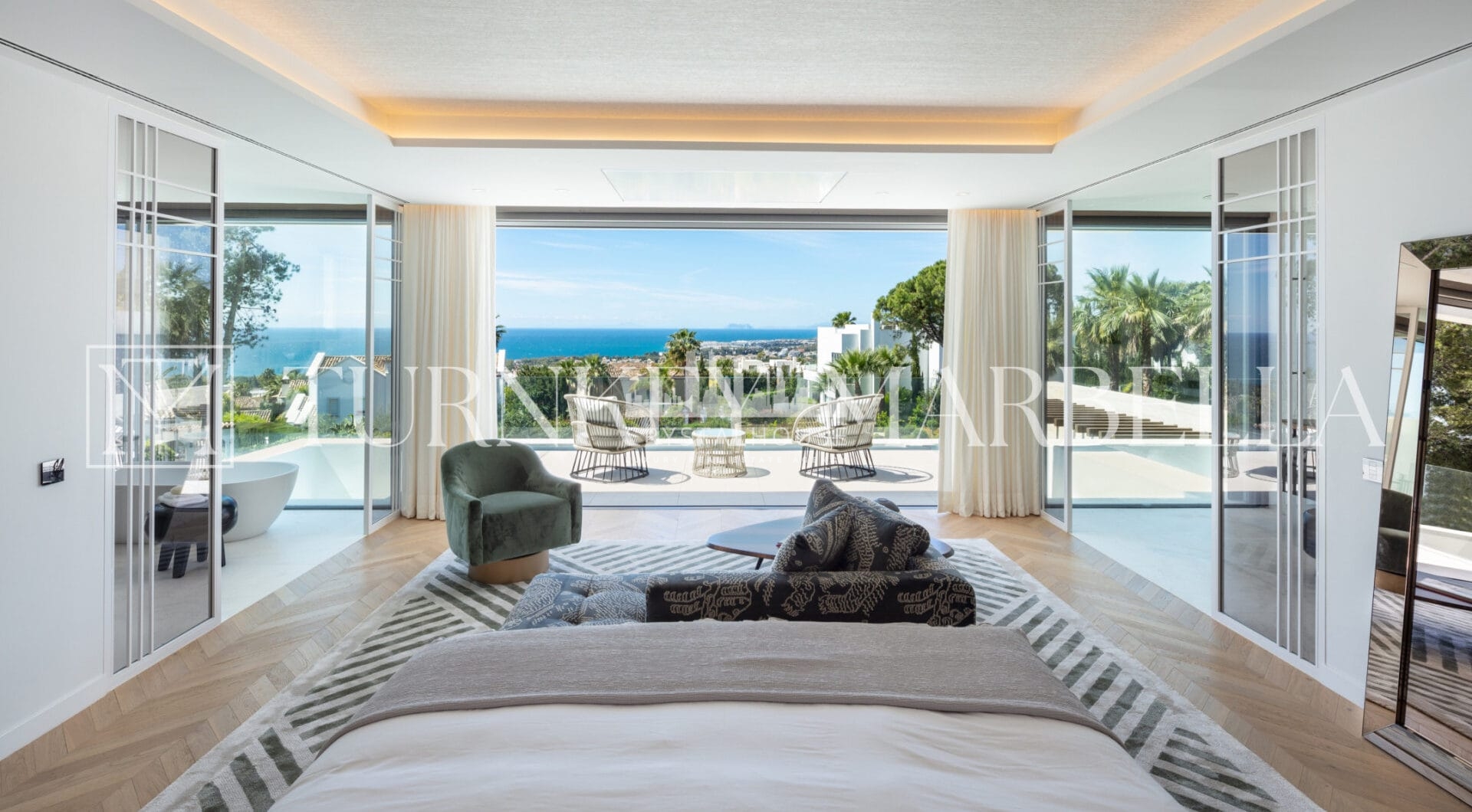 Set in the exclusive gated community of Sierra Blanca, Rossini 13 offers privacy, security, and panoramic sea views stretching to Gibraltar and the African coastline.