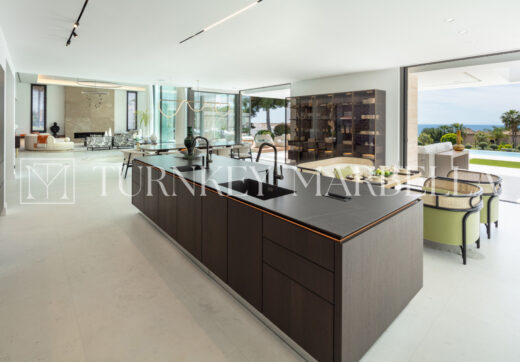Set in the exclusive gated community of Sierra Blanca, Rossini 13 offers privacy, security, and panoramic sea views stretching to Gibraltar and the African coastline.