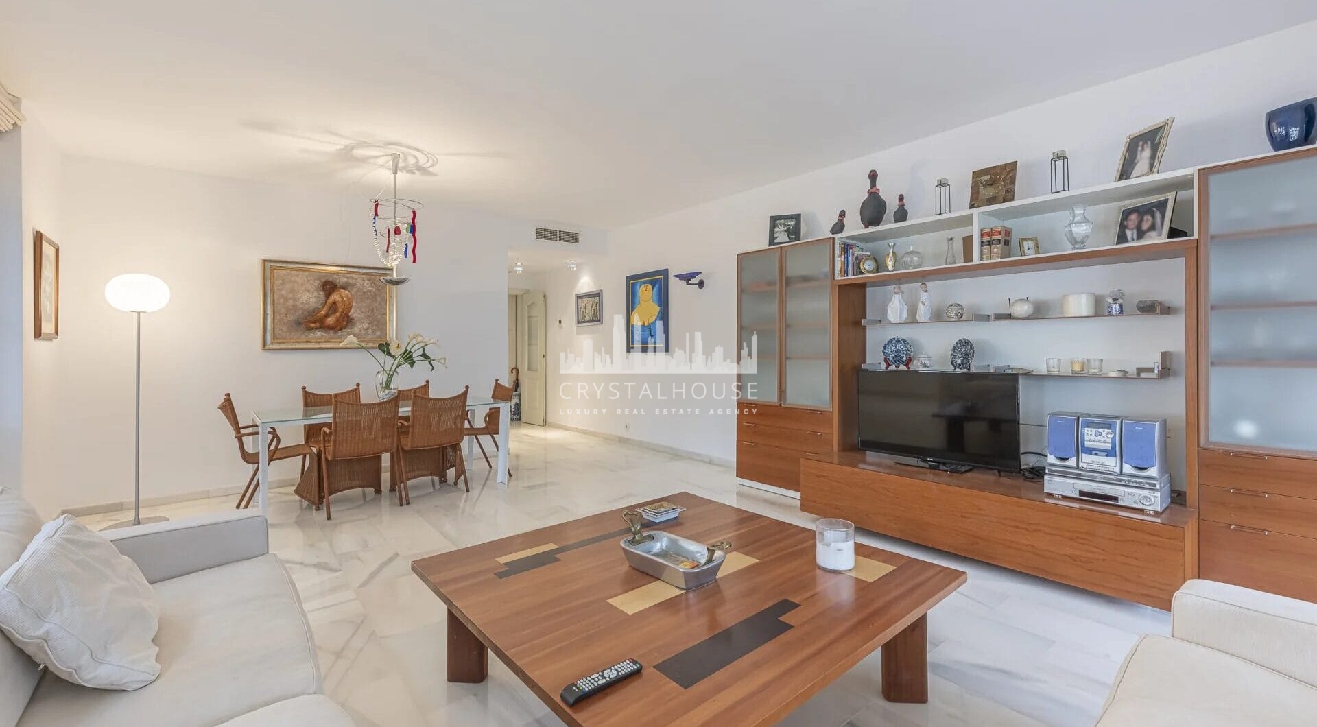 Situated within the sought-after gated community of Urbanización El Corralito, this beautifully maintained first-floor apartment presents a rare opportunity just a few steps from the iconic Mistral Beach.