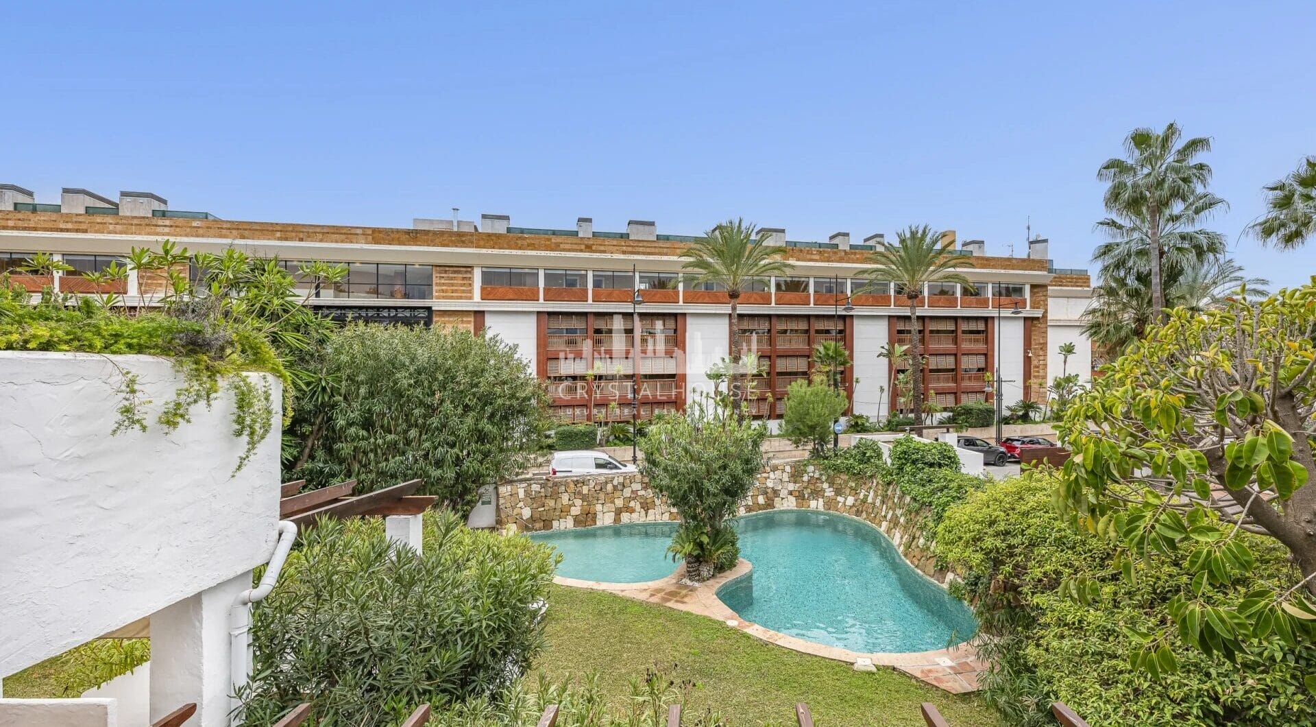 Situated within the sought-after gated community of Urbanización El Corralito, this beautifully maintained first-floor apartment presents a rare opportunity just a few steps from the iconic Mistral Beach.