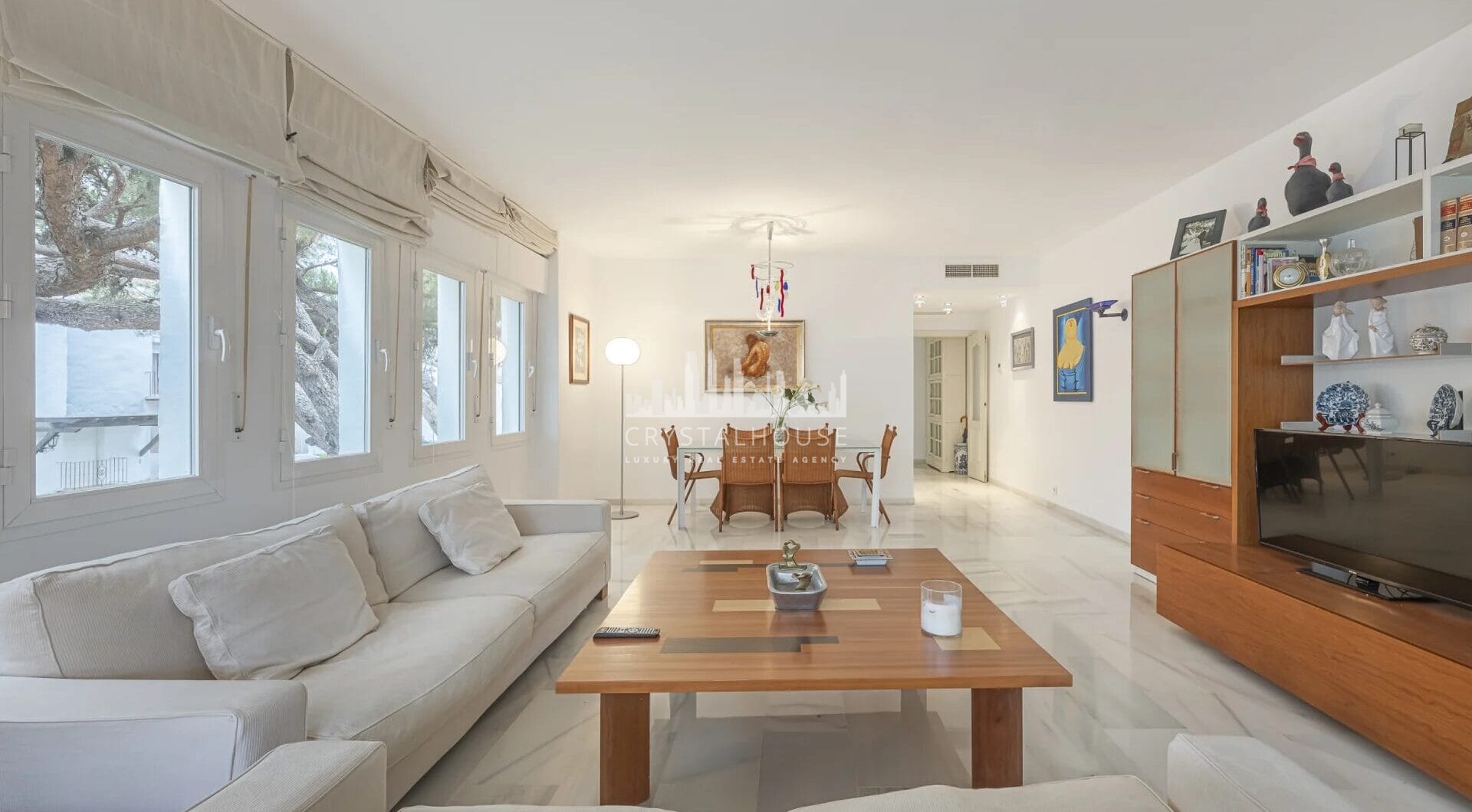 Situated within the sought-after gated community of Urbanización El Corralito, this beautifully maintained first-floor apartment presents a rare opportunity just a few steps from the iconic Mistral Beach.