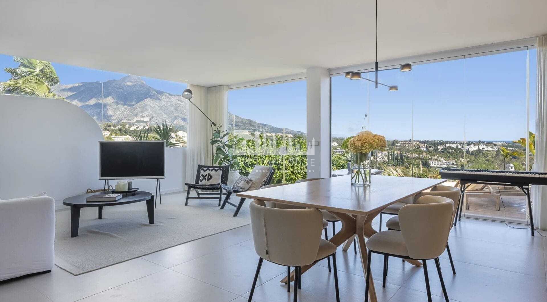 Experience luxury living in this stunning ground floor apartment located in the prestigious Palacetes de Les Belvederes.