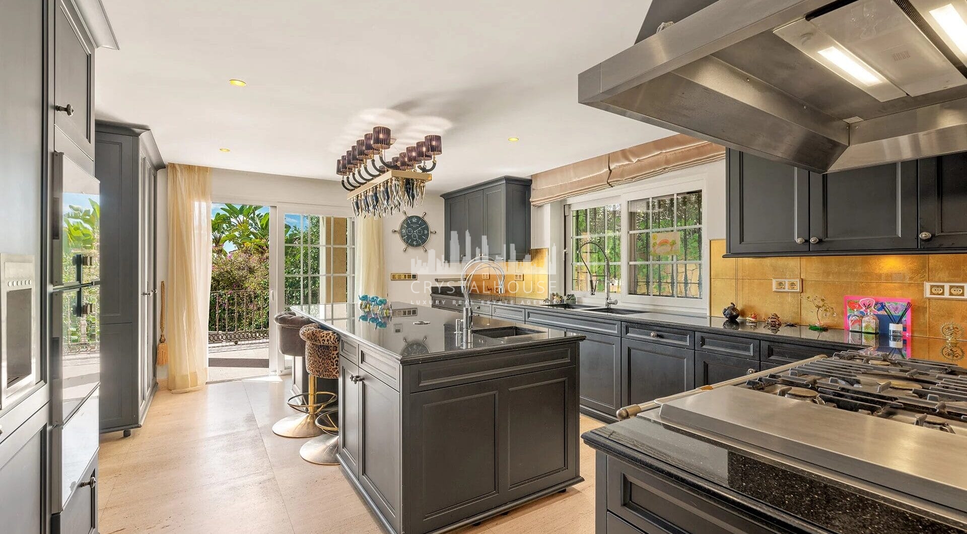 Nestled within the prestigious El Herrojo community, this 7-bedroom, 9-bathroom villa redefines opulent living.