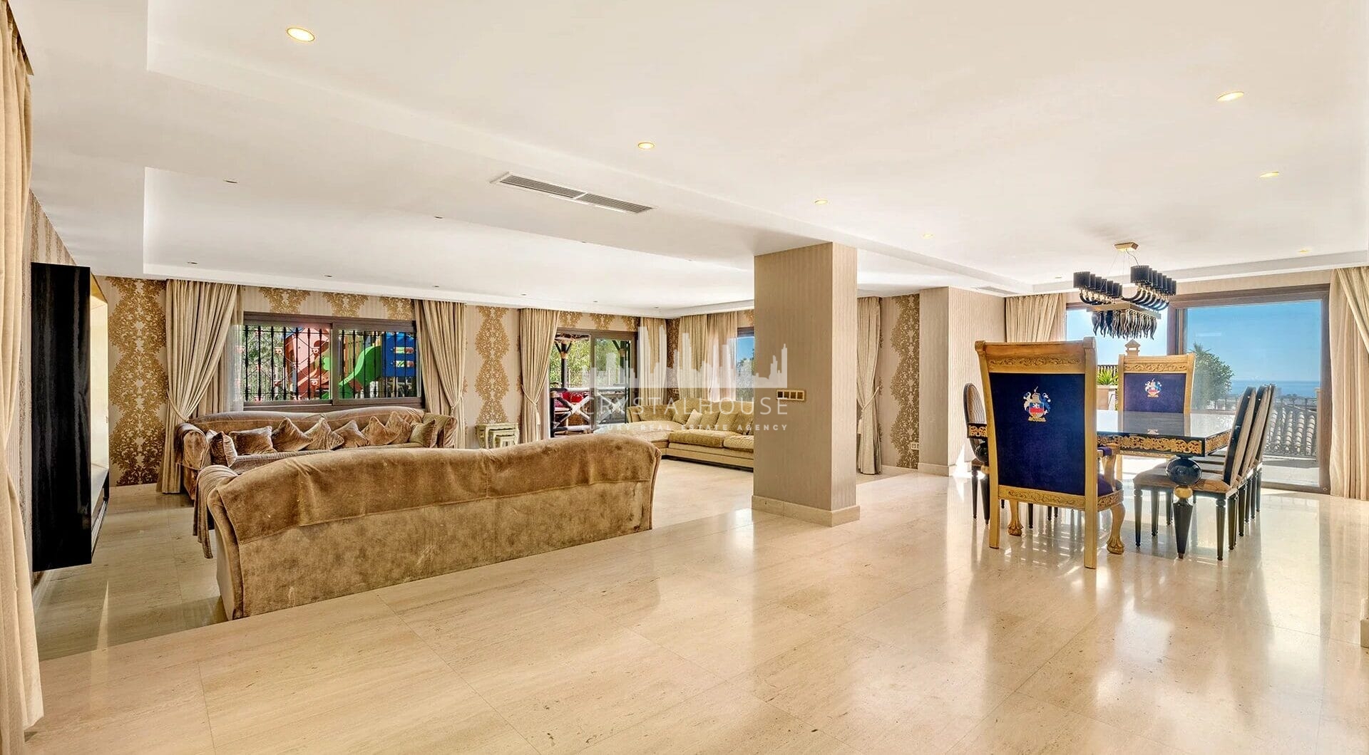 Nestled within the prestigious El Herrojo community, this 7-bedroom, 9-bathroom villa redefines opulent living.