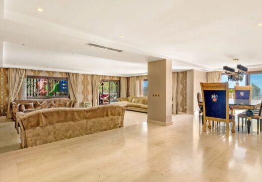 Nestled within the prestigious El Herrojo community, this 7-bedroom, 9-bathroom villa redefines opulent living.