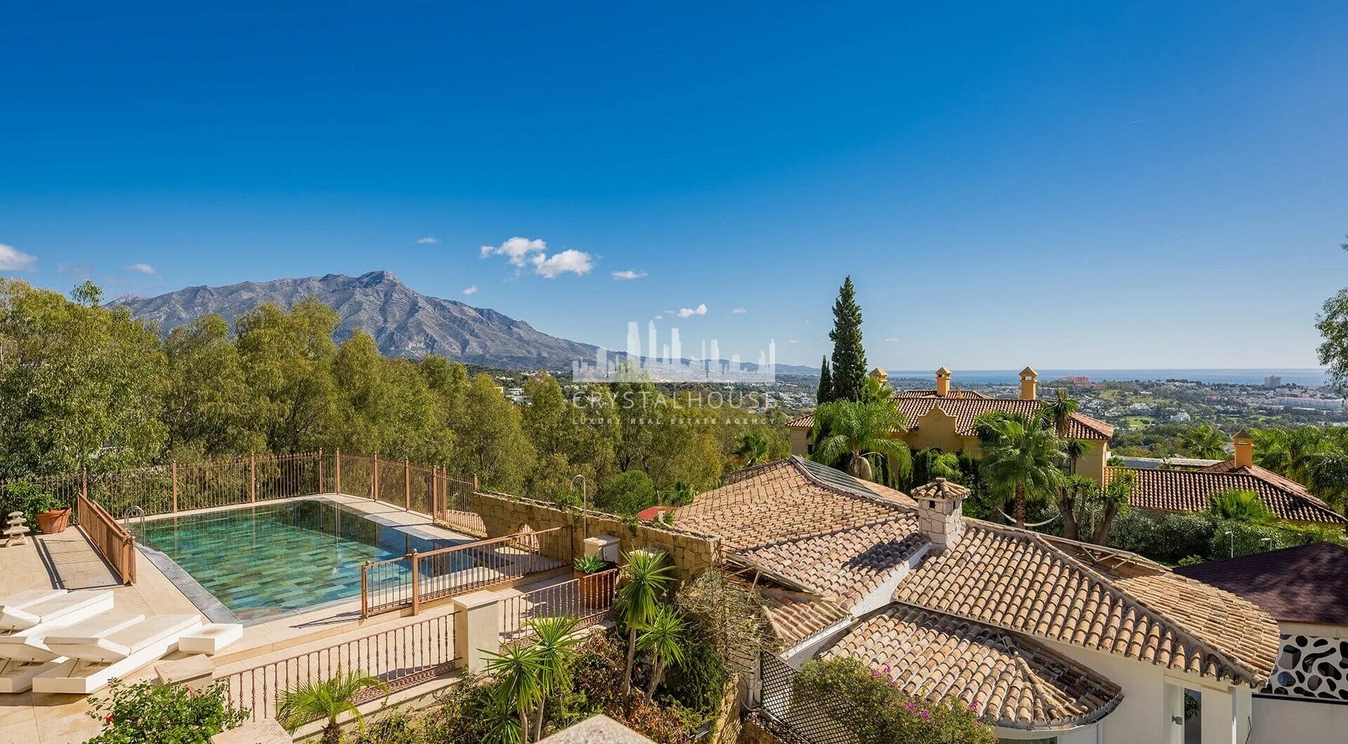 Nestled within the prestigious El Herrojo community, this 7-bedroom, 9-bathroom villa redefines opulent living.